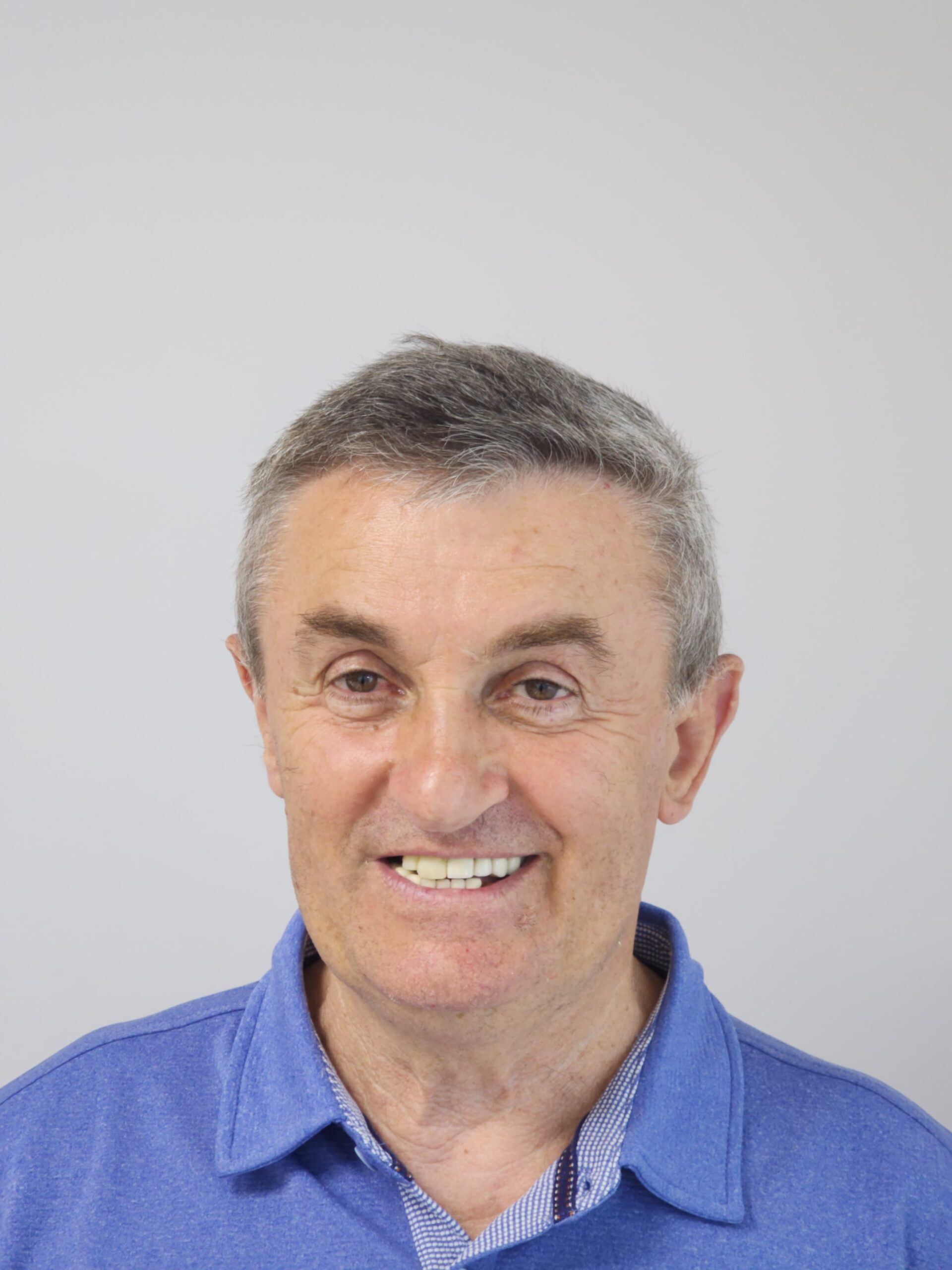 Comprehensive smile rehabilitation with implants and crowns — photograph 3 of 6